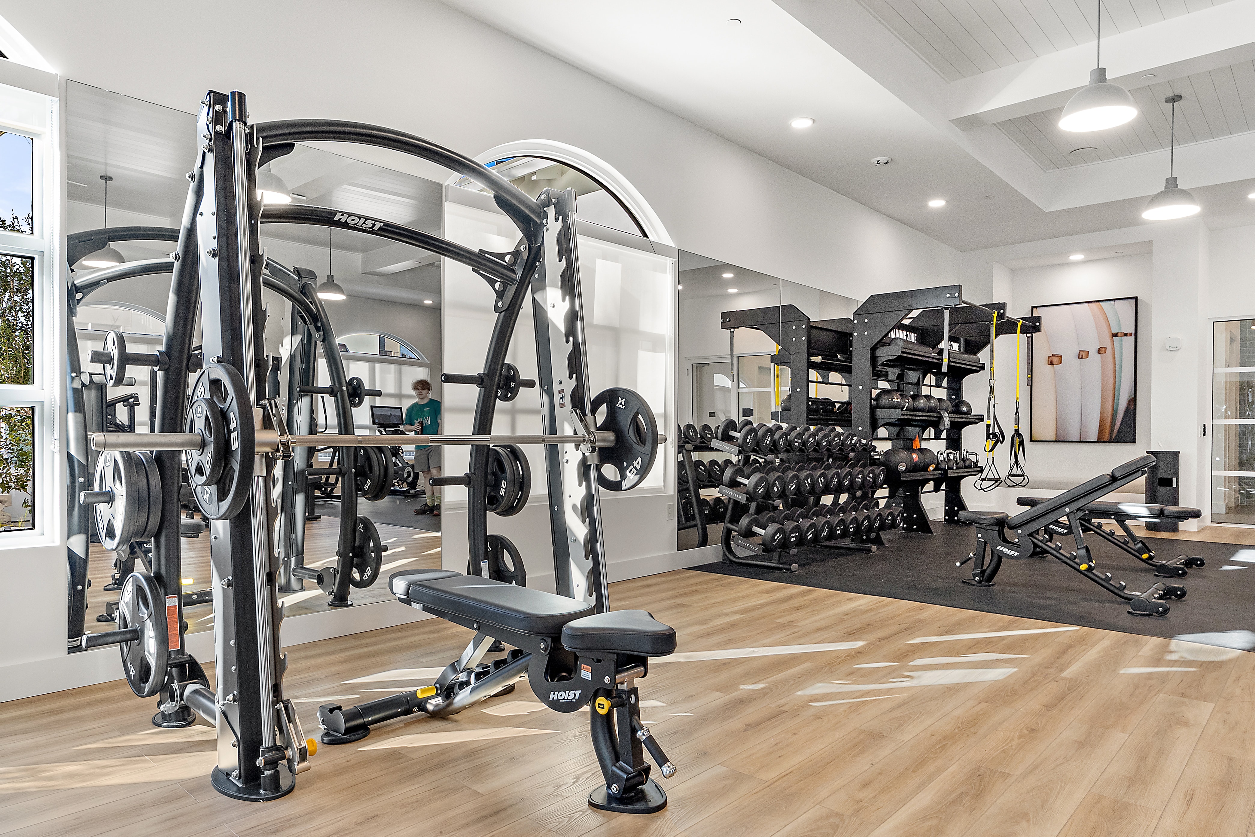 _E248629 gym with cardio and lifting equipment amenities at Soluna Apartments